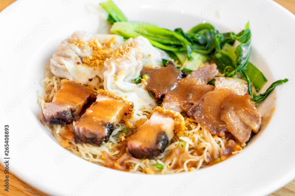 egg noodle with red roasted pork, crispy belly pork and wonton egg noodle with red roasted pork, crispy belly pork and wonton