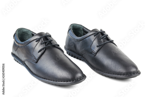 Black leather men's shoes standing side by side isolated on white background.