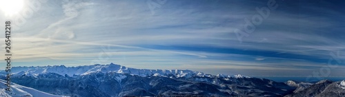 Panoramic view of the Caucasus mountains covered by snow in the ski resort of Krasnaya Polyana, Russia. © Viacheslav