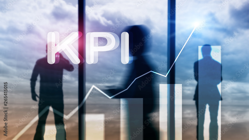 KPI - Key Performance Indicator. Business and technology concept. Multiple exposure, mixed media. Financial concept on blurred background KPI - Key Performance Indicator. Business and technology concept. Multiple exposure, mixed media. Financial concept on blurred background