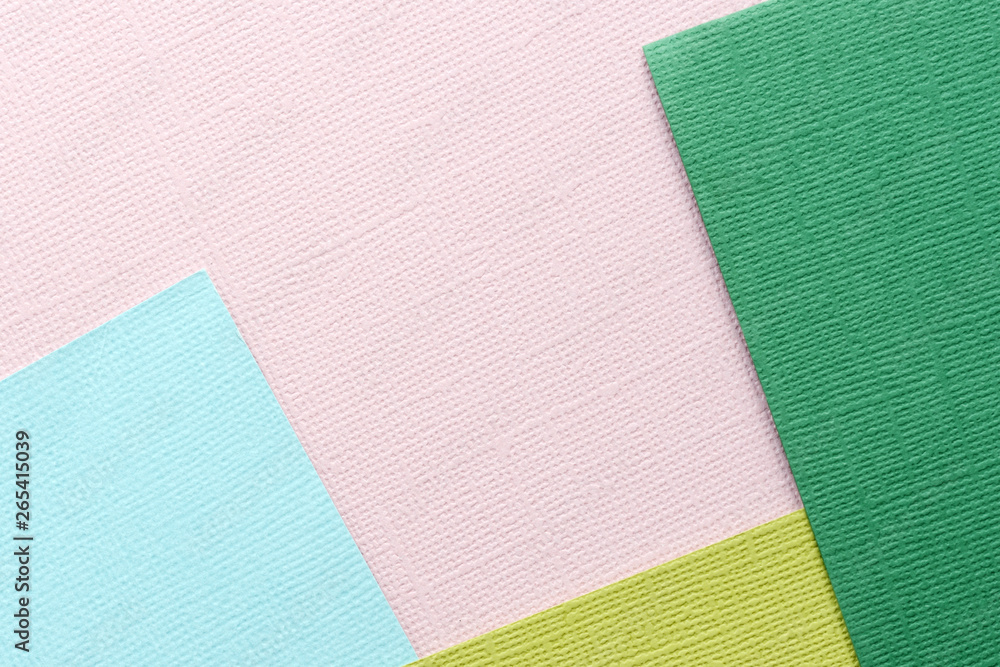 Fototapeta premium Pink, green, blue abstract paper background. Paper texture