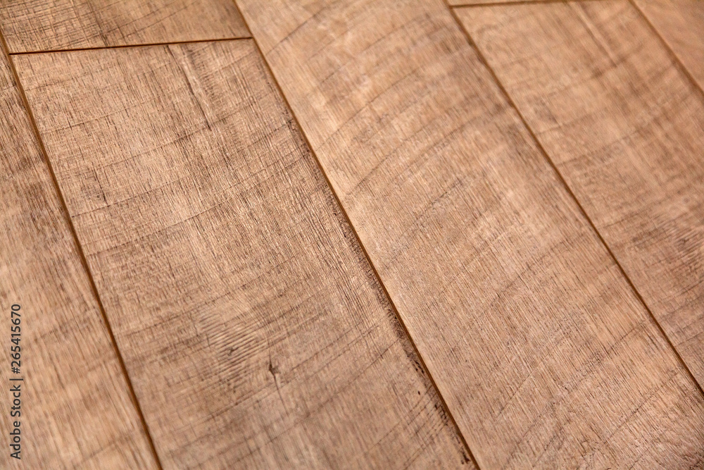 Different soft wood surface as background, wood texture. Wood wall. Close-up of a wide range of laminate in different colors. - obrazy, fototapety, plakaty 