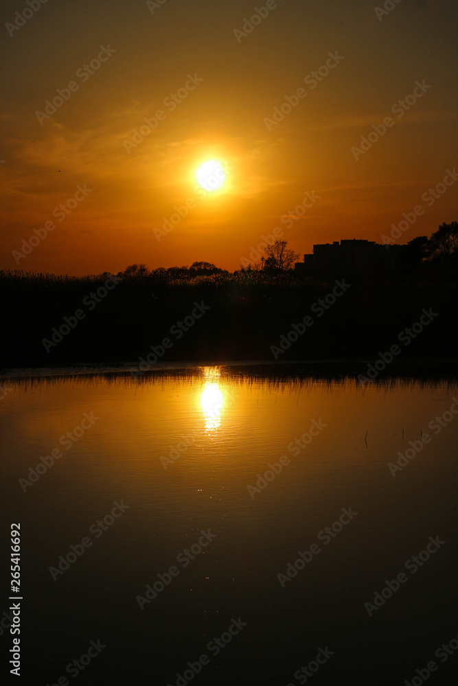 Scenic calm orange sunset over the lake Scenic calm orange sunset over the lake