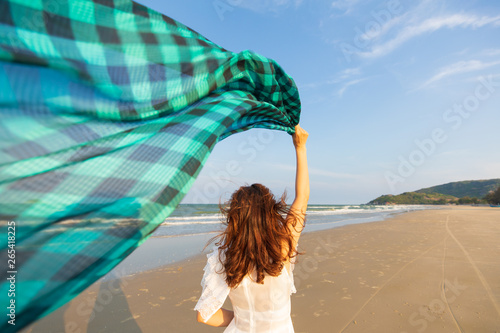 Photography Woman with waver cloth on beach