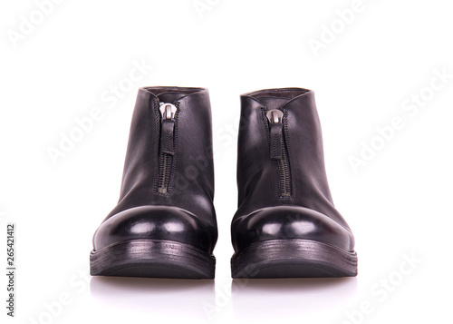 Black boots isolate on white background. A pair of men's black shoes with a zipper.