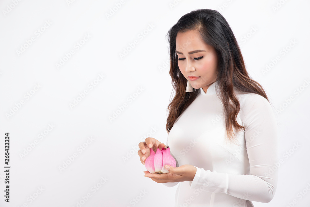 Vietnamese girl take photo with Vietnamese traditional clothes in studio Vietnamese girl take photo with Vietnamese traditional clothes in studio