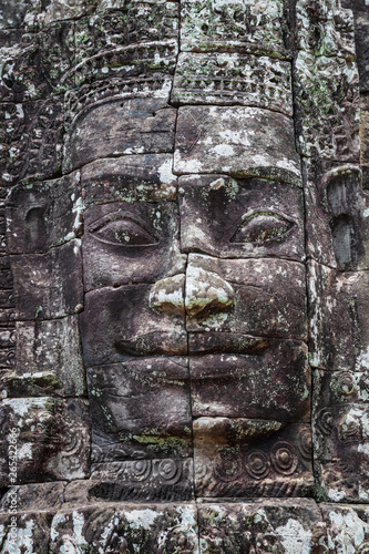 Beautiful face sculptures at the famous Bayon temple in the Angkor Thom temple complex, Siem Reap, Cambodia