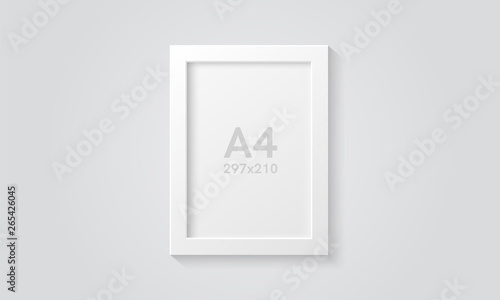 Fototapeta Naklejka Na Ścianę i Meble -  Picture frame isolated on a wall. White color. Realistic modern template. A4 vertical format. Mock up for pictures or photo. Beautiful minimal clean design. Eps 10 vector illustration.
