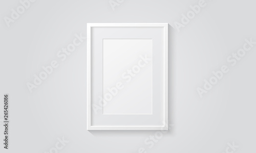 Picture frame isolated on a wall. White color. Realistic modern template. A4 vertical format. Mock up for pictures or photo. Beautiful minimal clean design. Eps 10 vector illustration.