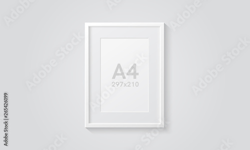Picture frame isolated on a wall. White color. Realistic modern template. A4 vertical format. Mock up for pictures or photo. Beautiful minimal clean design. Eps 10 vector illustration.