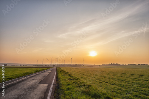 sunrise at a wind park in palatinate © Dirk