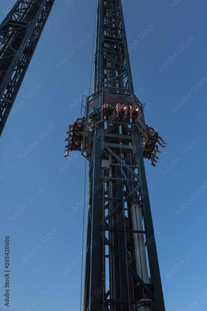 Metallic Tower in the Amusement Park: Crazy Speed Uphill and Downhill Metallic Tower in the Amusement Park: Crazy Speed Uphill and Downhill