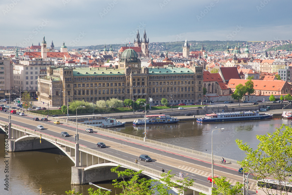 Obraz premium City Prague, Czech Republic. View from the mountain to the river and bridge. Spring. 2019. 24. April. Travel photo.