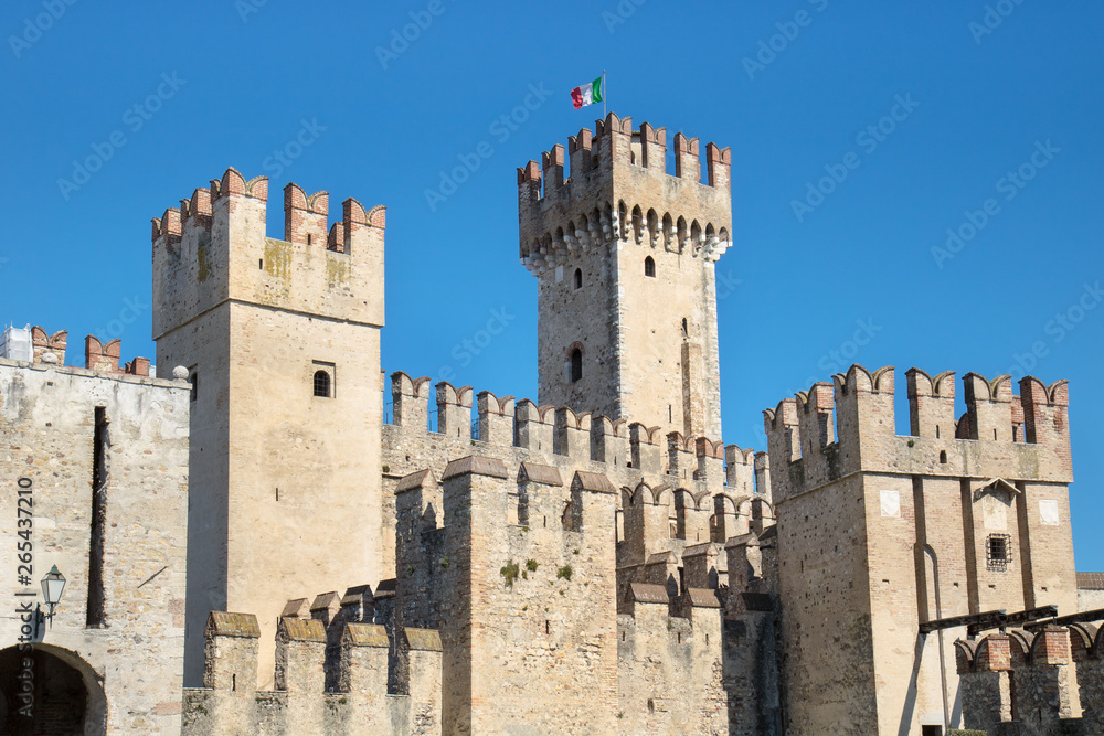 Tower of castle of Sirmione. Detail of medieval building Structure in Garda Lake (Italy)