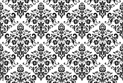 Wallpaper in the style of Baroque. Seamless vector background. White and black floral ornament. Graphic pattern for fabric, wallpaper, packaging. Ornate Damask flower ornament