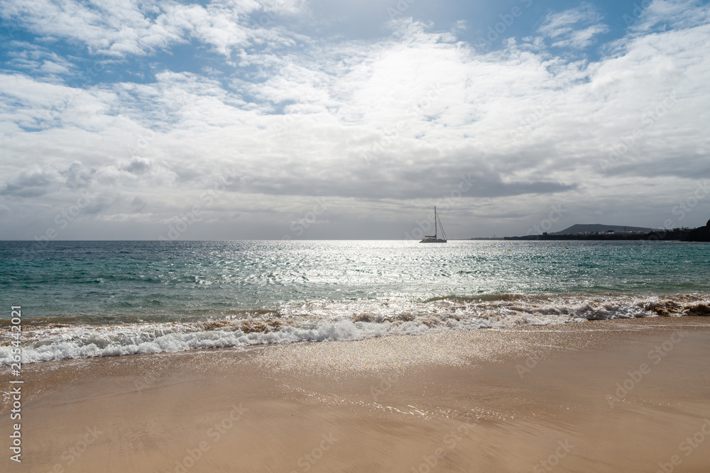 Panorama of beautiful beach and tropical sea of Lanzarote. Canaries