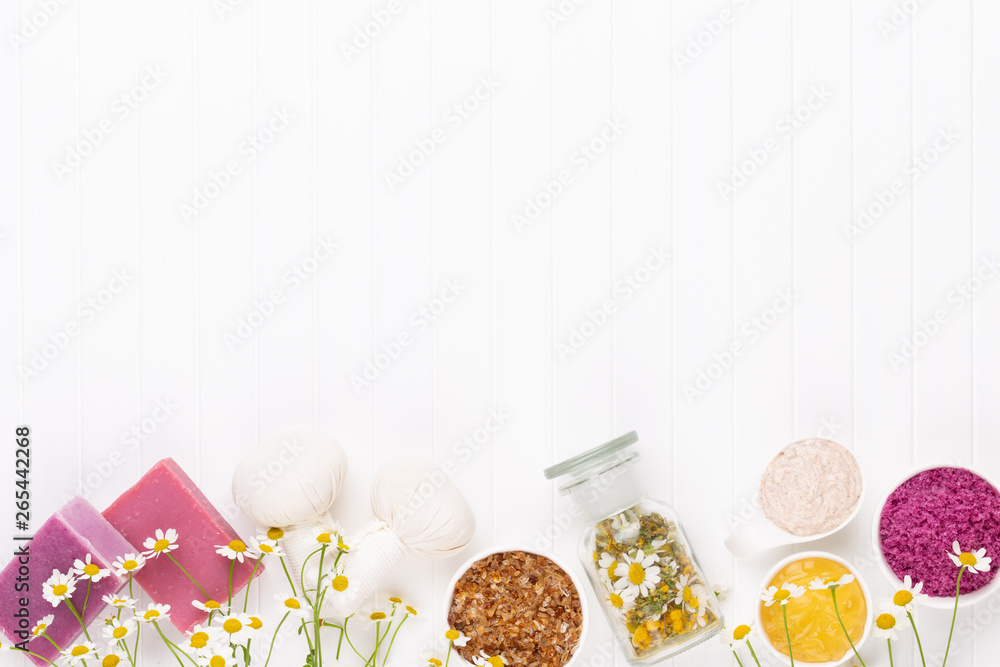 Spa still life with aromatherapy chamomile, herbal oil, soap, sea salt. Spa still life with aromatherapy chamomile, herbal oil, soap, sea salt.