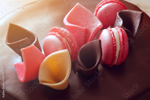 Fondant decorations on top of the chocolate cake. Simple fondant cake decorations