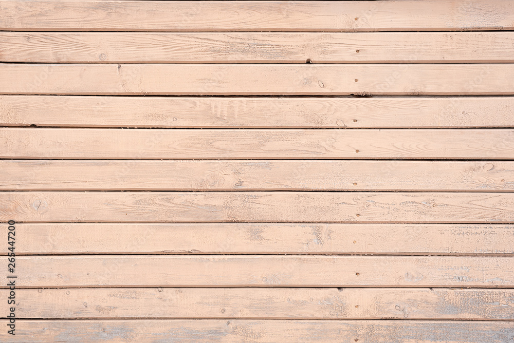 Shabby, painted, old wooden wall of beige, cream color. Shabby, painted, old wooden wall of beige, cream color.