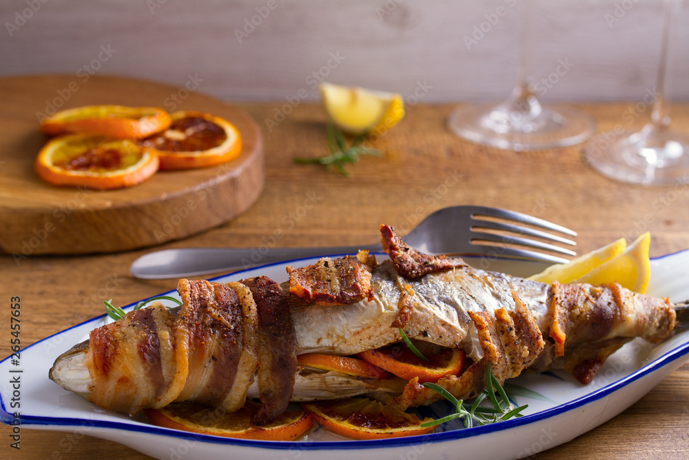 Grilled Bacon-Wrapped Whitefish. Fish wrapped with bacon