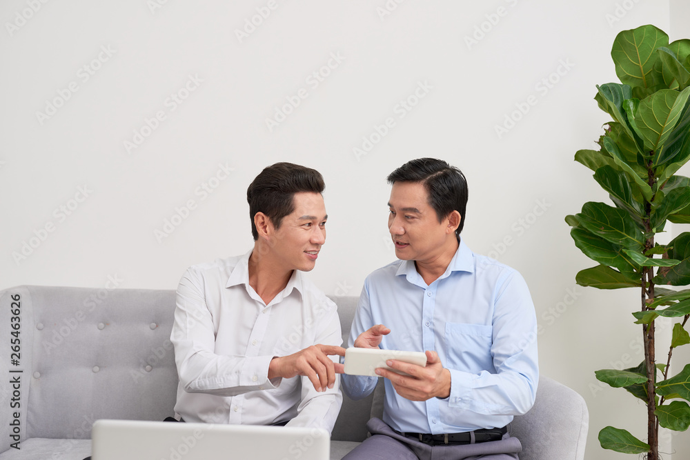 Two businessmen are working in office.Business concept. Two businessmen are working in office.Business concept.