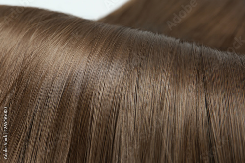 Beautiful brown hair, closeup view. Professional hairdresser