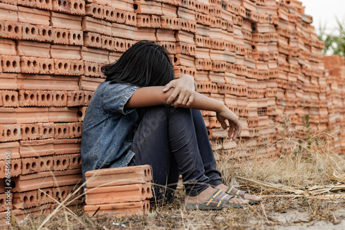 Child working in a brick factory. world day against child labor concept