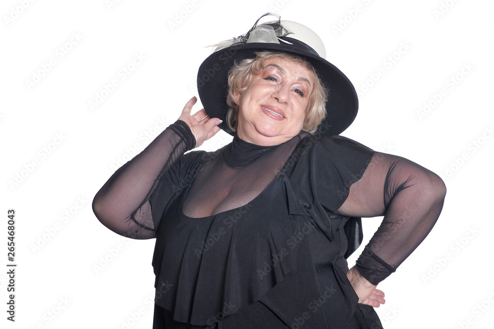 Smiling senior woman in black hat on white background Smiling senior woman in black hat on white background