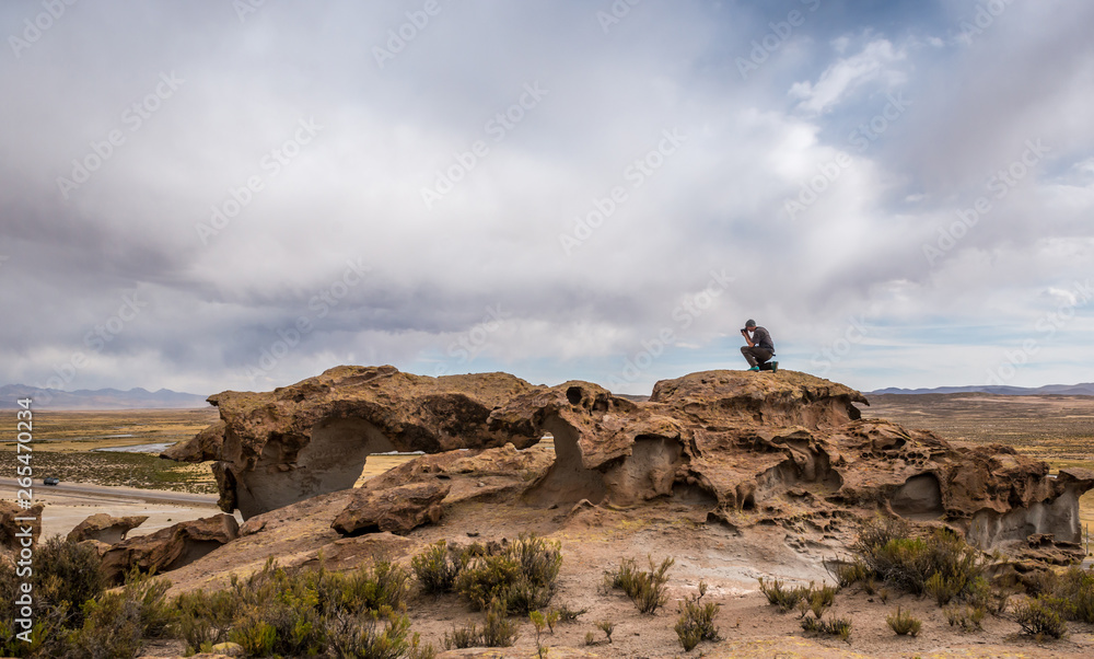 Scenery of rocky mountanious Bolivian landscape and photographer Scenery of rocky mountanious Bolivian landscape and photographer
