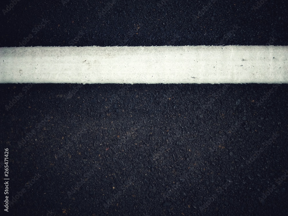 Fototapeta premium Road traffic paint White on the asphalt surface
