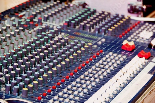 sound and audio mixer control panel with buttons and sliders