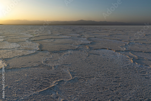 Sunset on the salt plains of Asale Lake in the Danakil Depression in Ethiopia  Africa