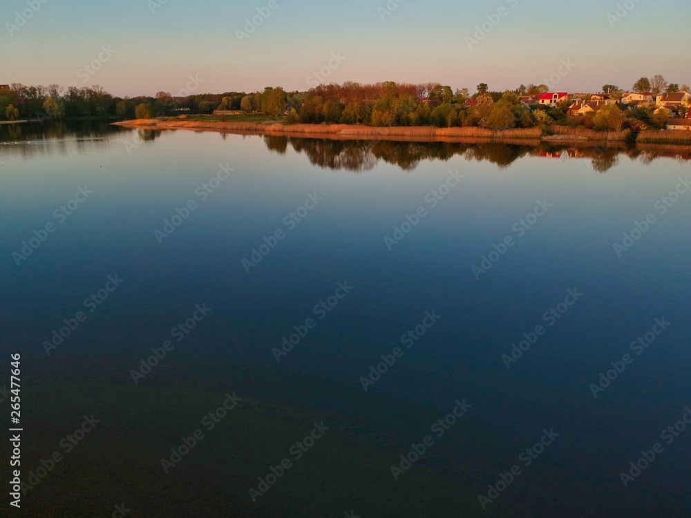Fototapeta premium Aerial view of a sunset above Nesvizh, Minsk Region, Belarus