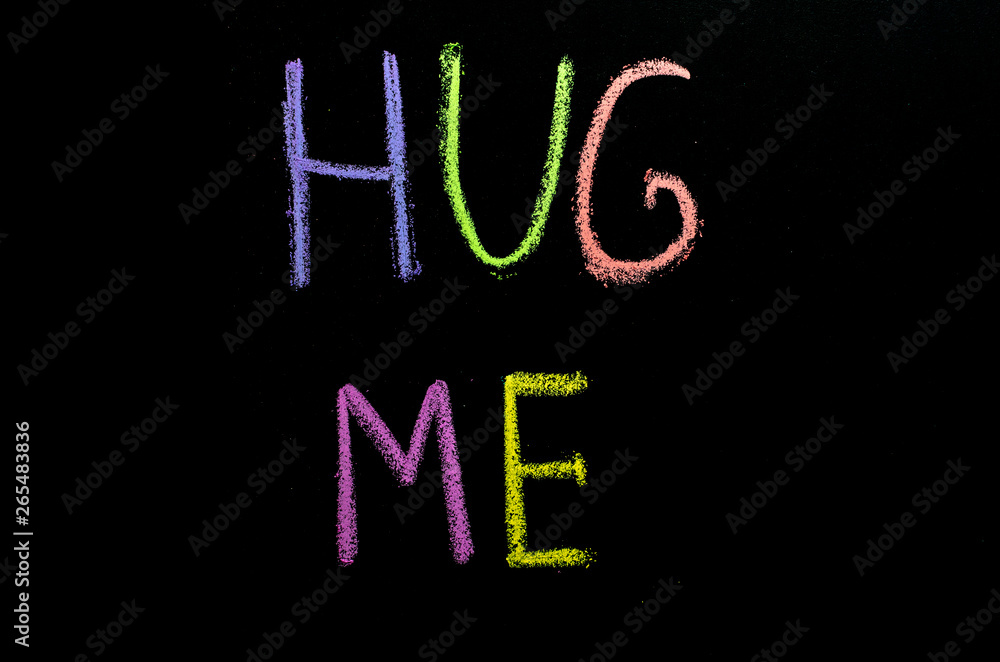 colored text hug me drawned on chalkboard colored text hug me drawned on chalkboard
