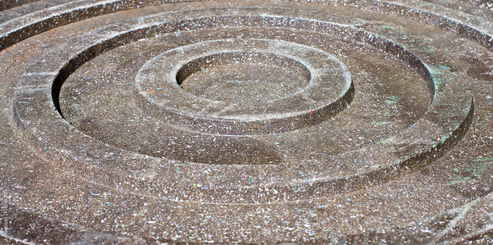 A fragment of the ring of the inspection sewer manhole made of polymer sand mixture. A fragment of the ring of the inspection sewer manhole made of polymer sand mixture.