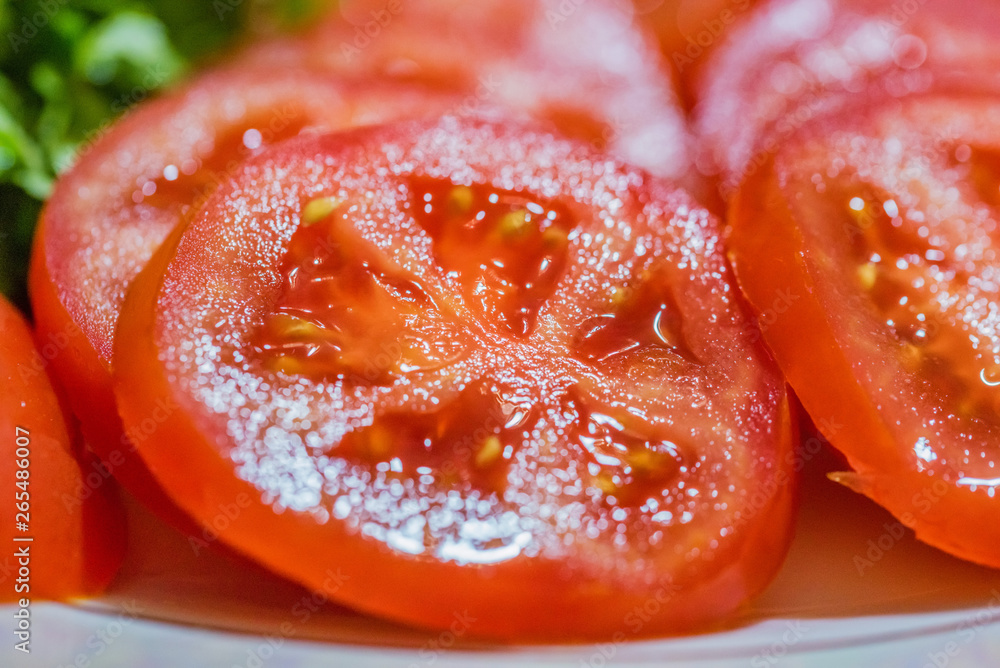 Close up slices of fresh juicy tomato Close up slices of fresh juicy tomato