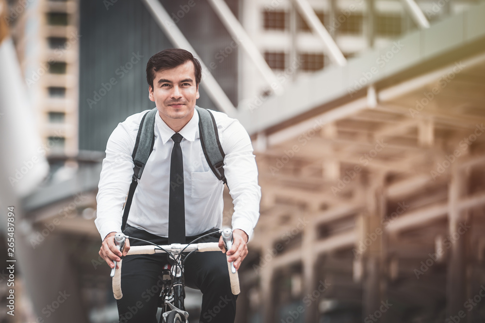 Businessmen riding bicycles