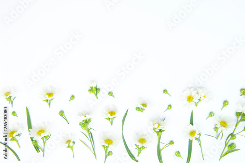 Flowers composition. Border made of daisy white flowers. Flat lay, top view © Saichol