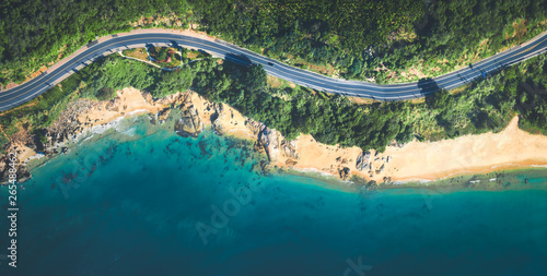 Fototapeta Naklejka Na Ścianę i Meble -  Aerial view of the sandy beach and  road