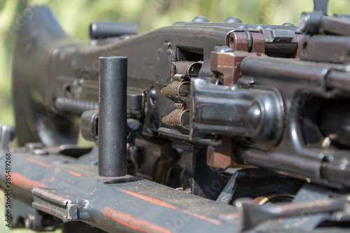MG-42 - German World War II machine gun at the gun show, close-up with selective focus on the machine gun belt