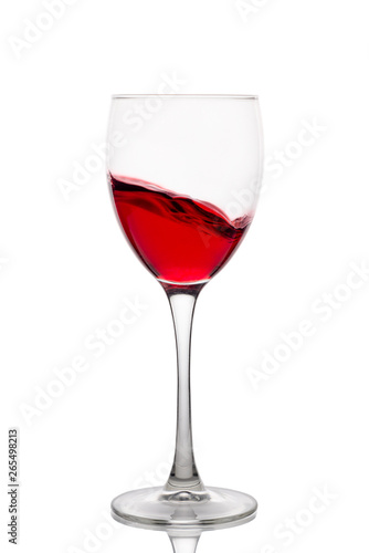 Glass of red wine. Isolated on white background.