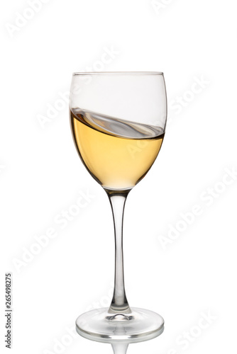 Glass of white wine isolated on a white background.