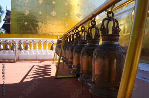 Bells in a row at Wat Phra Singh temple Chiang Mai photo