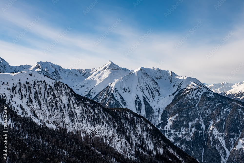 Winter panorama of mountains in Pitztal Hoch Zeiger ski resort in Austria Alps. Ski slopes. Beautiful winter day.