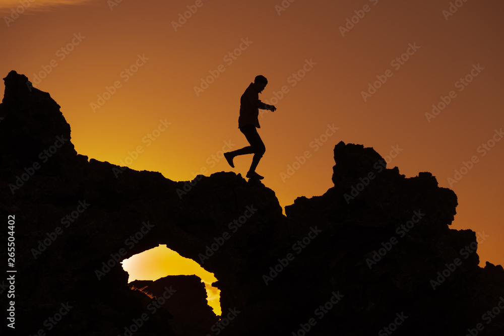 Sunset Running on Volcanic Rocks Sunset Running on Volcanic Rocks