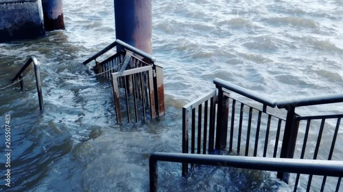 Water coming during a hurricane over the street stairs, Hamburg