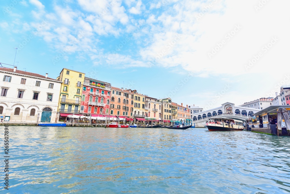 Rialto Bridge and Colourful Italian Houses at the Grand Canal in Venice