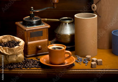 cup of coffee  turka  coffee beans and a coffee grinder  croissants