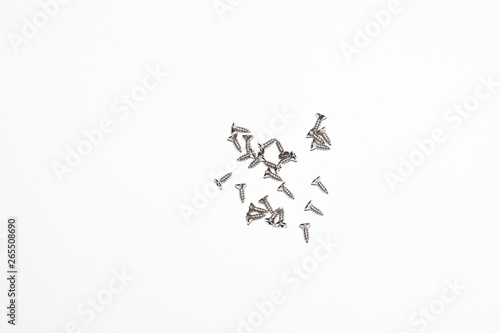 The screw, nut and bolts on white background. Closeup isolated on a white background