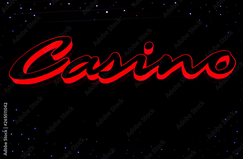 Casino sign isolated on black background, gambling, symbol
